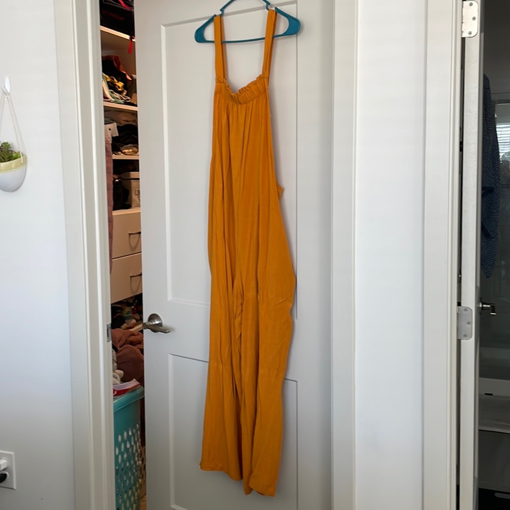 Cute Jumpsuit with pockets. Extra comfy to wear at home or out!
